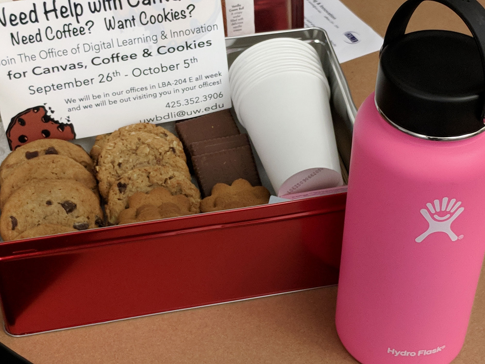 mobile cookie cart. box with cookies and coffee.