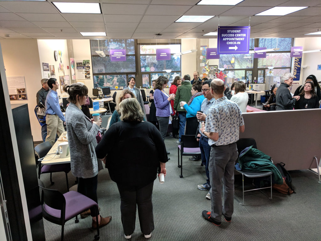 Faculty gathering for coffee